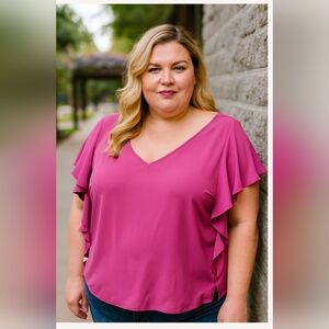 Jennifer Lopez Vibrant Pink Ruffle Blouse